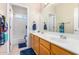 Bathroom with dual vanity, tub and shower at 1377 W Park Ave, Gilbert, AZ 85233