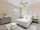 Bright, serene bedroom featuring a bed, dresser, and nightstands with stylish decor and a ceiling fan at 1377 W Park Ave, Gilbert, AZ 85233