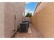Exterior shot showing AC units and a side view of the property at 1377 W Park Ave, Gilbert, AZ 85233