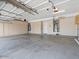 Spacious garage with ample storage cabinets, a water heater and easy access points at 1377 W Park Ave, Gilbert, AZ 85233