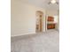 This room is spacious and features neutral decor and includes a view of the kitchen and bathroom at 1377 W Park Ave, Gilbert, AZ 85233