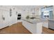 Spacious kitchen featuring an island with granite countertops and stainless steel appliances at 13914 E Laurel Ln, Scottsdale, AZ 85259
