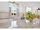 Bright kitchen featuring a farmhouse sink, granite countertops, and stainless steel appliances at 13914 E Laurel Ln, Scottsdale, AZ 85259