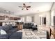 Open-concept living room showcases neutral decor, contemporary furnishings, and seamless transitions at 15272 W Georgia Dr, Surprise, AZ 85379