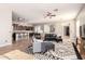 Open-concept living room showcases natural light and flows into the kitchen and dining areas at 15272 W Georgia Dr, Surprise, AZ 85379