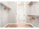 Spacious walk-in closet with ample hanging space and tiled floor at 15272 W Georgia Dr, Surprise, AZ 85379