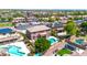 Scenic aerial view of community homes highlighting backyard pools, solar panels and well manicured lawns at 15725 W Yucatan Dr, Surprise, AZ 85379