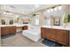Bright bathroom featuring a soaking tub, double vanity, and ample counter space at 15725 W Yucatan Dr, Surprise, AZ 85379