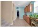Bright hall with adjacent storage and a built in desk at 15725 W Yucatan Dr, Surprise, AZ 85379