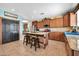A kitchen featuring an island with bar stool seating, stainless appliances, and ample cabinets at 15725 W Yucatan Dr, Surprise, AZ 85379