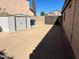 Spacious backyard featuring a storage shed and block wall for added privacy at 15939 W Post Dr, Surprise, AZ 85374