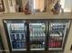 Entertainer's delight with a full beverage refrigerator, offering a variety of options to keep the party going at 15939 W Post Dr, Surprise, AZ 85374