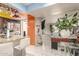 Bright, open kitchen with white tile flooring and a breakfast bar at 1618 N 32Nd St # 5, Phoenix, AZ 85008