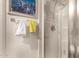 Bright bathroom showing the clear glass shower featuring a modern showerhead and a towel rack at 1618 N 32Nd St # 5, Phoenix, AZ 85008