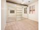 Spacious bedroom with mirrored closet, neutral carpet, and ceiling fan at 16515 N 71St Dr, Peoria, AZ 85382
