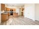 Modern kitchen with stainless steel appliances, island, and bright lighting at 16515 N 71St Dr, Peoria, AZ 85382