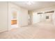 Large main bedroom with mirrored closet doors leading to en-suite bath and walk-in closet at 16515 N 71St Dr, Peoria, AZ 85382