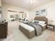 Elegant main bedroom with decorative rug, mirrored sitting room, and natural light at 16515 N 71St Dr, Peoria, AZ 85382