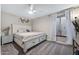 Cozy bedroom with a neutral color palette, plush carpet, and ample natural light at 1934 E Cypress Tree Dr, Gilbert, AZ 85234