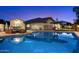 Backyard oasis featuring a pool, patio furniture, and outdoor grill, perfect for entertaining at 1934 E Cypress Tree Dr, Gilbert, AZ 85234