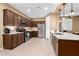 Spacious kitchen features stainless steel appliances, plenty of counter space and ample storage at 19627 W Badgett Ln, Litchfield Park, AZ 85340