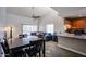 Open-concept layout featuring living, dining, and kitchen areas, perfect for entertaining and everyday living at 205 N 74Th St # 201, Mesa, AZ 85207