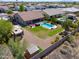 Aerial view of a home featuring a backyard pool, hot tub, outdoor seating, and RV parking at 226 W Crimson Sky Ct, Casa Grande, AZ 85122