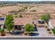 Aerial view of a home with desert landscaping, RV parking, and solar panels at 226 W Crimson Sky Ct, Casa Grande, AZ 85122
