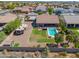 Aerial view of a well-maintained backyard with a pool, hot tub, and recreational vehicle parking at 226 W Crimson Sky Ct, Casa Grande, AZ 85122