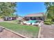 Expansive backyard with a pool, hot tub, and RV parking offering plenty of room at 226 W Crimson Sky Ct, Casa Grande, AZ 85122