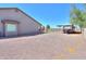 Expansive backyard with gravel, perfect for parking an RV or enjoying outdoor gatherings at 226 W Crimson Sky Ct, Casa Grande, AZ 85122