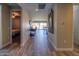 Long hallway with tile flooring leading to living areas and bedrooms, promoting an open and spacious feel at 226 W Crimson Sky Ct, Casa Grande, AZ 85122