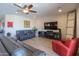 The living room offers comfortable seating and an entertainment center at 226 W Crimson Sky Ct, Casa Grande, AZ 85122