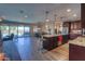 Spacious open floorplan features a combined kitchen, dining, and living area with outdoor access and views at 226 W Crimson Sky Ct, Casa Grande, AZ 85122