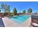 Tranquil pool and spa area with manicured landscaping, offering a serene retreat at 226 W Crimson Sky Ct, Casa Grande, AZ 85122