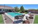 Inviting pool and outdoor seating, creating a perfect backyard oasis for entertaining at 226 W Crimson Sky Ct, Casa Grande, AZ 85122