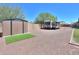 RV parking area with shed and artificial turf accent at 226 W Crimson Sky Ct, Casa Grande, AZ 85122