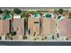 Aerial view of homes with backyard pools, patios, and desert landscaping in a residential area at 230 S 122Nd Ln, Avondale, AZ 85323
