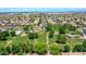 Expansive community view featuring a park, green spaces, and residential areas, providing a serene and Gathering-friendly environment at 230 S 122Nd Ln, Avondale, AZ 85323