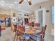 Open concept view of kitchen and dining area. Seating for eight and lots of light at 230 S 122Nd Ln, Avondale, AZ 85323