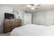 This bedroom boasts a neutral color scheme and a ceiling fan for added comfort at 2330 E Elmwood St, Mesa, AZ 85213