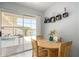 Cozy dining area with sliding glass doors to the outdoor patio at 2330 E Elmwood St, Mesa, AZ 85213