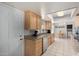 Functional kitchen features light wood cabinets and stainless steel appliances at 2330 E Elmwood St, Mesa, AZ 85213