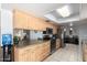 Spacious kitchen with stainless steel appliances and a view to the dining area at 2330 E Elmwood St, Mesa, AZ 85213