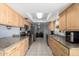Bright kitchen featuring stainless steel appliances and ample cabinet space at 2330 E Elmwood St, Mesa, AZ 85213