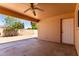 Covered patio with ceiling fan provides a comfortable outdoor living space at 2330 E Elmwood St, Mesa, AZ 85213