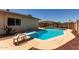 Private pool with diving board offers a refreshing retreat in the backyard at 2330 E Elmwood St, Mesa, AZ 85213
