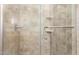 The bathroom includes a tiled walk-in shower with glass door and modern fixtures at 2330 E Elmwood St, Mesa, AZ 85213
