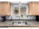 Close-up of the kitchen sink with a window view and plenty of natural light at 2330 E Elmwood St, Mesa, AZ 85213