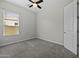 Bedroom featuring neutral paint, carpet, natural light, and closet at 2354 E Lieber Pl, Phoenix, AZ 85024